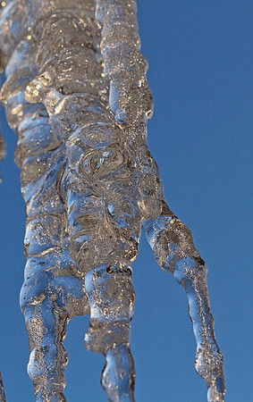 Large Icicle melting on a sunny February day