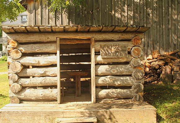 Kids Cabin built in 2010 as a replica log house that serves as children's playhouse.